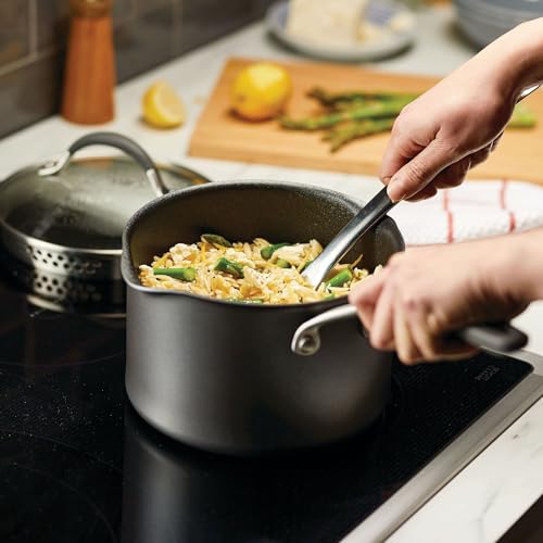 Image of Circulon A1 Series Nonstick Straining Sauce Pan with Lid, 3-Quart, Graphite | Nonstick cookware with ScratchDefense technology, induction ready pot with straining lid, easy release, oven safe to 400AF