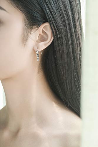 Boucles d'oreilles pendantes argent pour un mariage chic