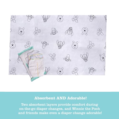 Image of Disney Baby by J.L. Childress Disposable Changing Pads for Baby - Diaper Changing Table Covers, Travel Essentials for Babies, Absorbent Liner Pads, Leak-Resistant, 26 inchx18 inch - Winnie the Pooh, 24 Count
