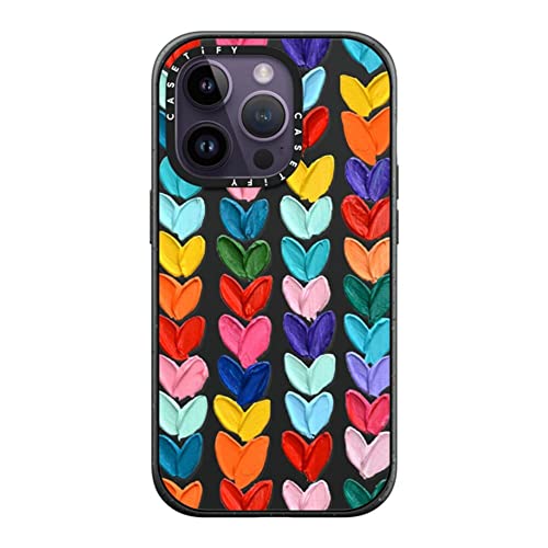 Coque iPhone 14 Pro CASETiFY Impact noir mat avec cœurs à pois