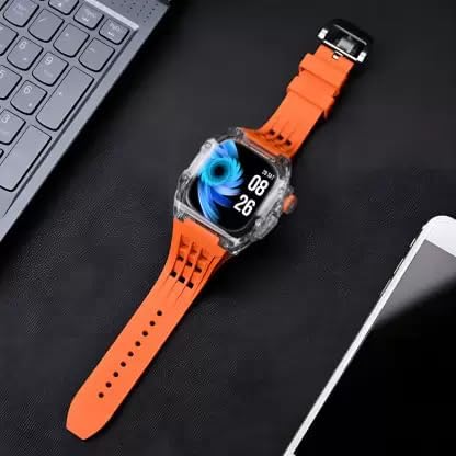 Kalobee H9 Smart Watch on a desk next to a smartphone and laptop
