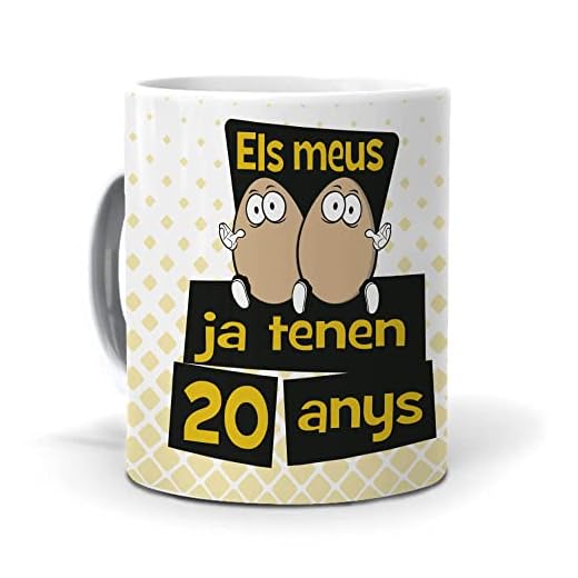 mundohuevo Taza Regalo 20 cumpleaños Hombre en Catalan ELS meus Ous ja tenen 20 anys. Ceramica AAA - 350 ml.