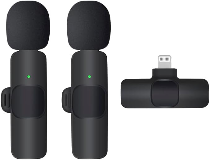 Image showing two black wireless microphones with foam windscreens and a black Lightning receiver. The microphones have green indicator lights.
