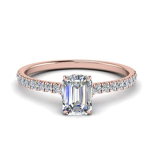 Bague halo émeraude en or rose, le symbole d'une promesse éternelle unique