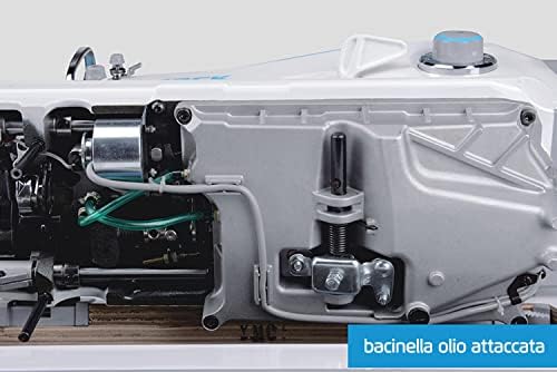 Close-up view of the machine's internal oil basin and mechanism