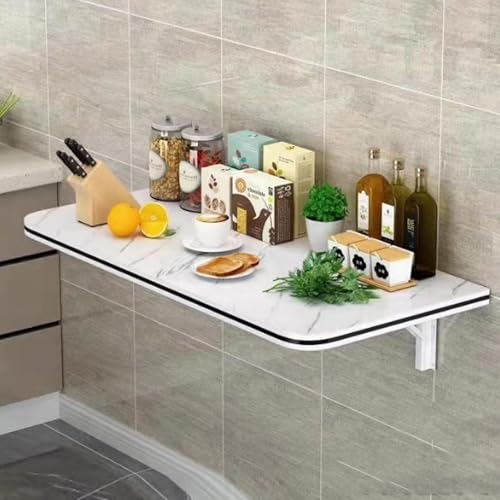 Mesa plegable con hojas abatibles, solución que ahorra espacio para lavandería y banco de trabajo en pequeñas zonas de estar y comedor