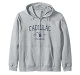 La chemise Cadillac Michigan unique présente le design sportif classique classique vieilli bleu marine et est un excellent moyen de montrer la fierté patriotique de votre ville natale. Cadeau parfait pour ceux qui aiment son charme et fiers d'être de Cadillac MI.