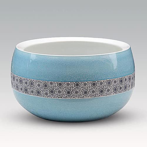 Culture chinoise et tradition : pot de fleurs bleu vintage pour décoration végétale