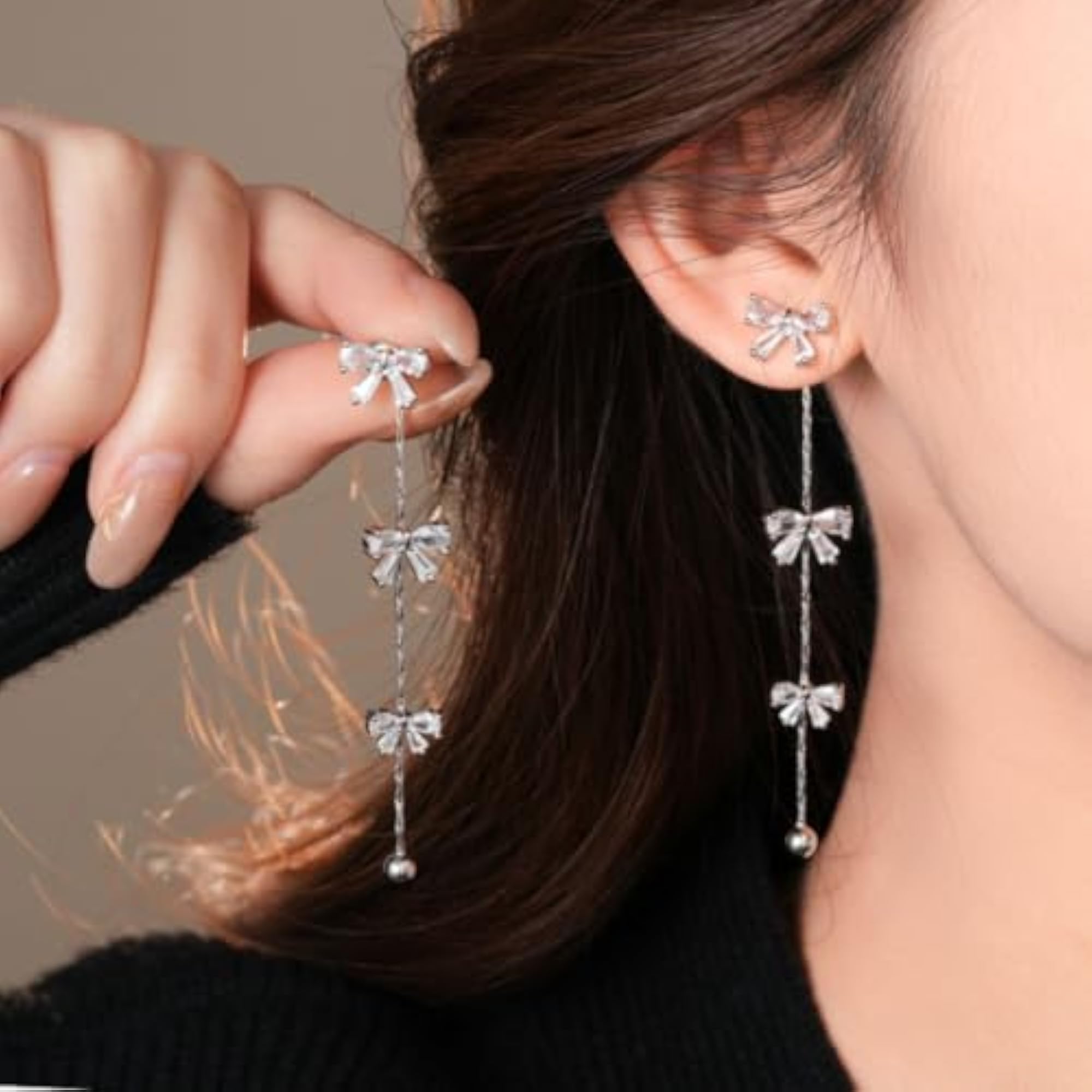 Women's Silver Bow Dangle Earrings