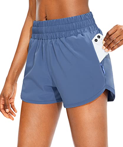 Short de course pour femme avec poches zippées sport taille haute