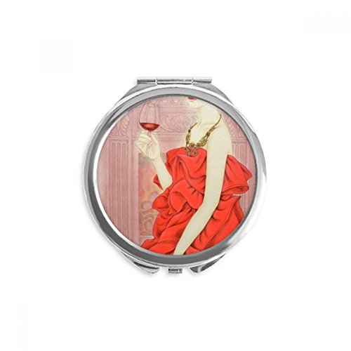 Miroir de poche rouge dans votre sac à main pour retouches de maquillage en voyage