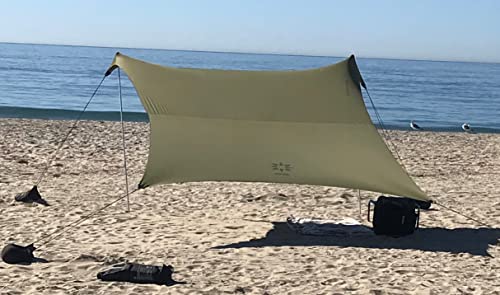 Image of Neso Portable Beach Tent Sun Shelter with Sand Anchor - Lightweight Beach Shade Canopy - Easy Setup for Family Outings - Patented Reinforced Corners - UPF 50+ Sun Protection - 7 x 7ft - Army Green