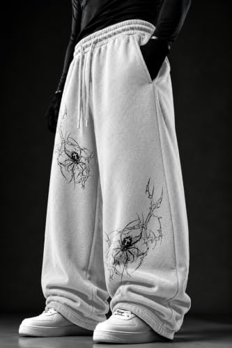 Image of Aesthetic Gothic Wide Leg Pants for Men | Tribal Print Baggy Streetwear | Oversized Track Pants with Elastic Waist | Black and White Relaxed Fit Bottoms