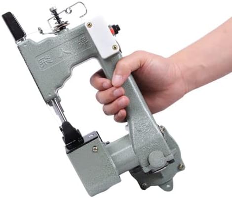 Hand holding and operating the GK9-2 bag sealing machine
