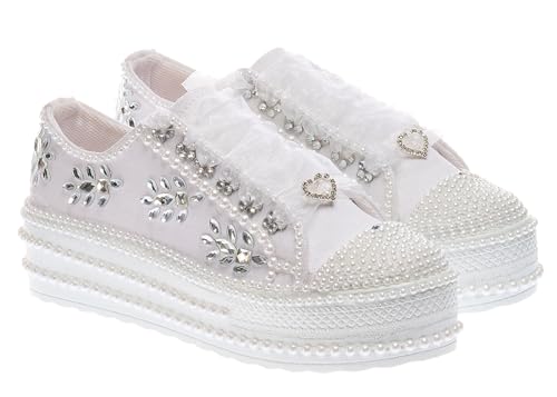 Presents Handmade Bridal Shoes adorned with exquisite Crystal Stones, crafted to perfection for the discerning bride. Elevate your wedding ensemble with personalized luxury, featuring elegant 1.5 Inch Heels designed to make you shine on your special day.