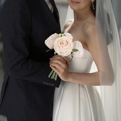 Fleurs artificielles dans un vase roses maison et mariage
