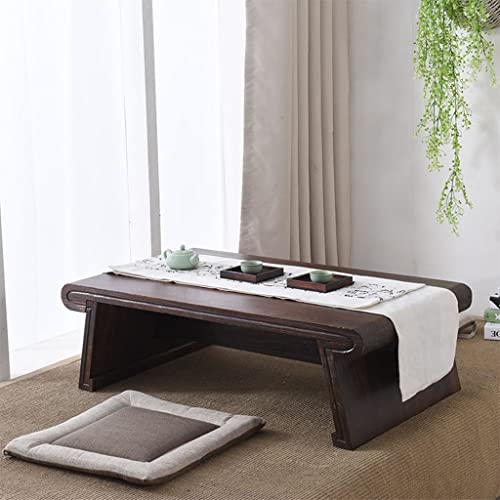Table basse basse résolvant le manque d'espace pour un salon de thé zen
