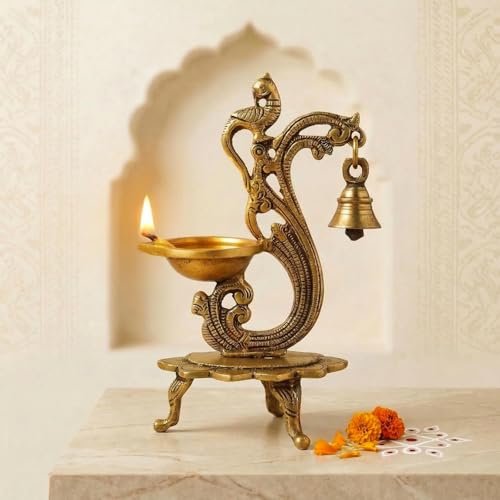 Image of ExclusiveLane 'Sacred Peacock' Brass Table Diya with Bell (100% Pure Brass, 1 Wick, 19.6 Cm, 20 ml, 0.64 kg, Hand-Etched) | Brass Diya for Pooja Traditional Decorative Diya for Pooja