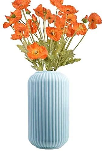 Vase en céramique bleu pour embellir facilement un coin de table vide