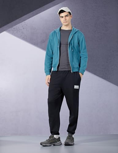 Image of Styli Men Fleece Panel Jogger with Drawcord & Patch Detail | Stylish Outfit for Men | Perfect for Casual, Party & Everyday Wear