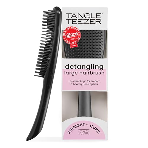 Image of Tangle Teezer Large Ultimate Detangler Brush, Straight to Wavy Hair, Black | Hairbrush with patented two-tier teeth & a 20% larger paddle detangles & reduces breakage on straight to wavy hair