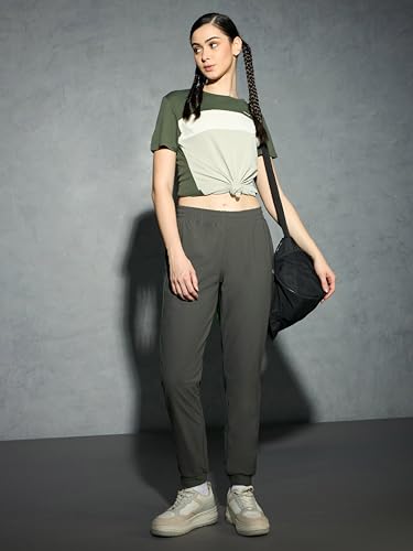 Image of TECHNOSPORT Womens Mid Rise Polyester Regular Fit Solid Jogger for Running, Workout & Sports