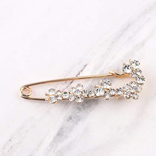 Épingle à nourrice papillon strass pour ajuster un décolleté plongeant