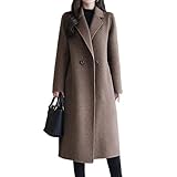 Features tailored long silhouette with classic lapel and button front. This versatile piece serves as both sophisticated trench coats for women and timeless womens winter coats long. Practical pockets and sleek design create flattering, modern vibe for everyday wear.