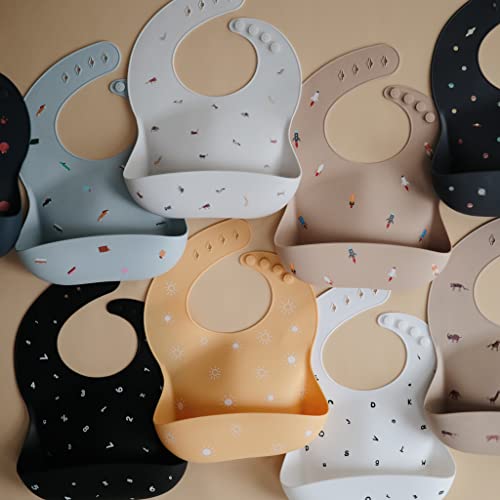 Image of mushie Silicone Baby Bib | Adjustable Fit Waterproof Bibs (Letters White)