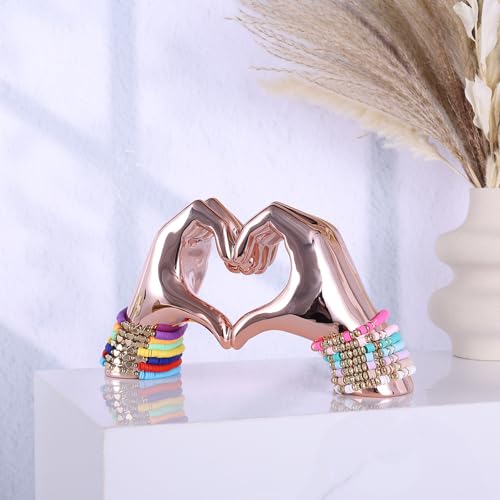 Estatua decorativa de corazón y mano en resina rosa miniatura 5