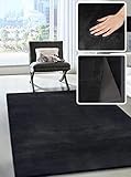 the carpet Cosy kuschelig Warmer Fellteppich, weich und elegant, waschbar und Fußbodenheizung geeignet, Öko-Tex Zertifiziert, Schwarz, 70 x 140 cm