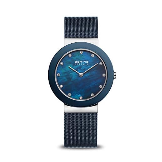 BERING Damen Quarz Uhr | Armbanduhr 35 mm silbernes Edelstahlgehäuse und blaues Zifferblatt | Milanaisearmband | Saphierglas | 5 ATM | 11435-387