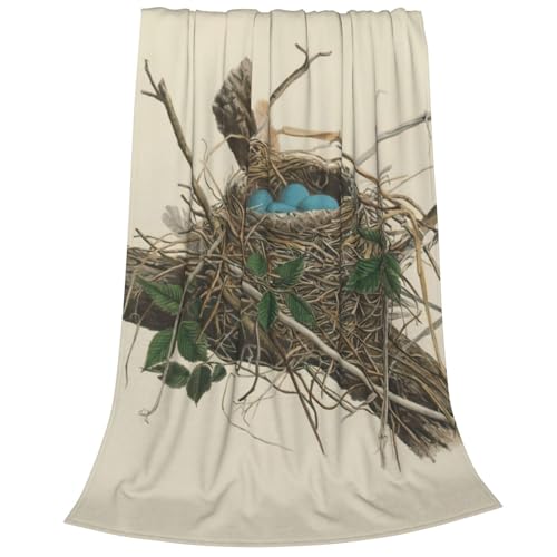 Couverture polaire douce pour cocooning sur canapé et nuits fraîches