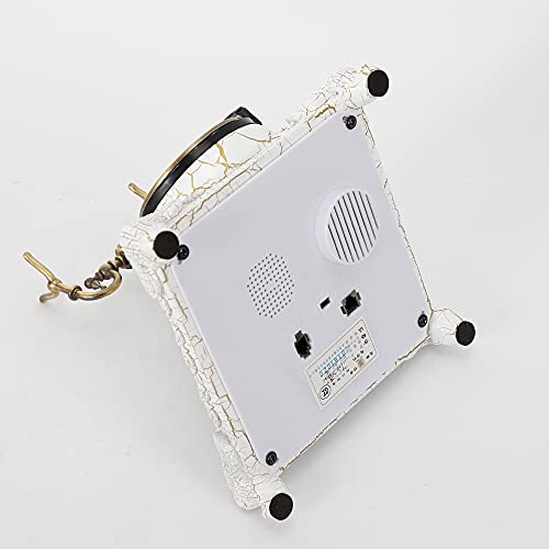 Teléfono retro con disco giratorio estilo vintage miniatura 4