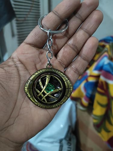 Image of Doctor Strange Eye Of Agamotto Marvel Keychains Rotating Keychain (Dr Strange Revolving Green Stone)