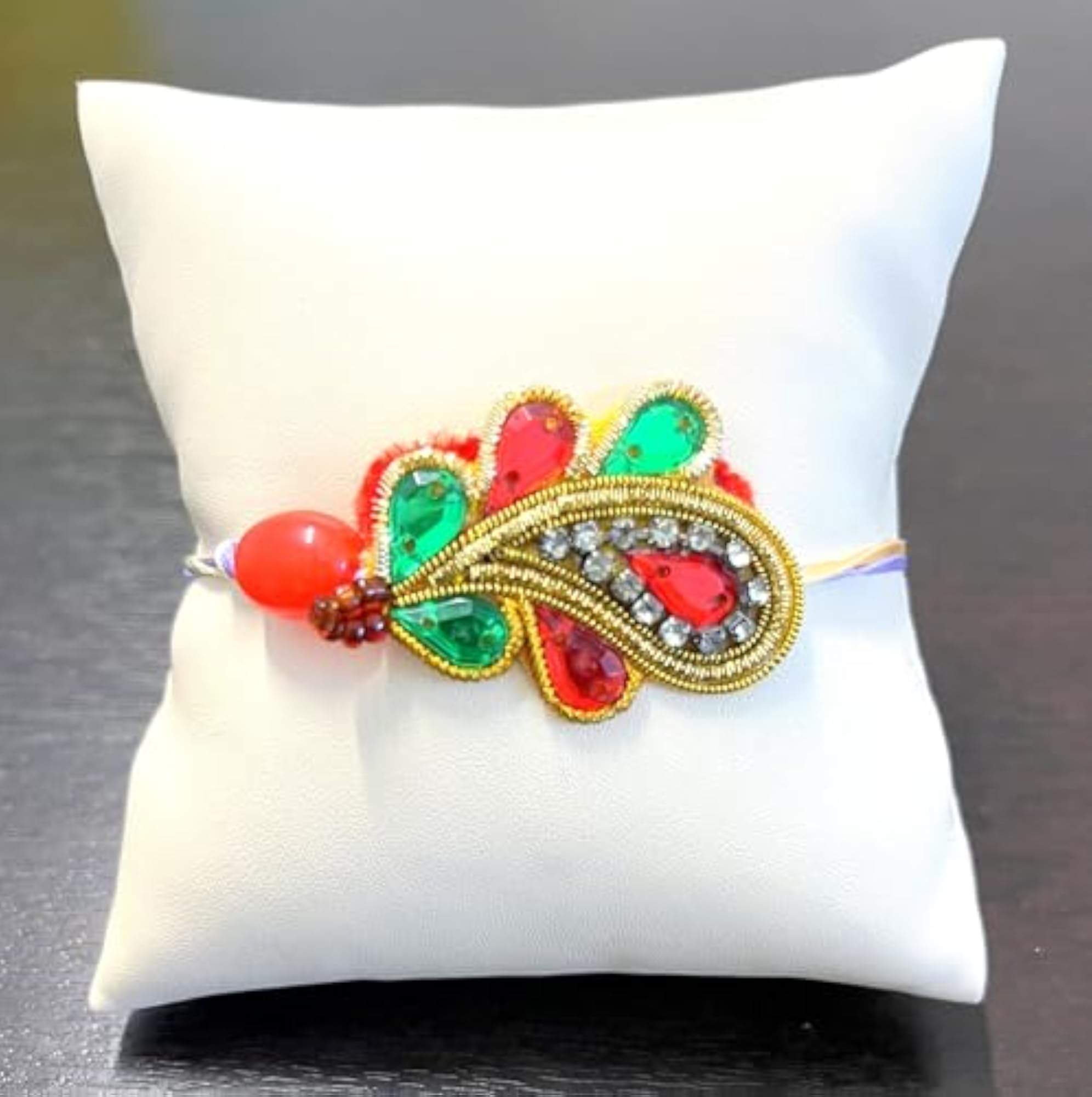 Orange Green Paisley Dabka Rakhi Bracelet with Satin Strings & Tika