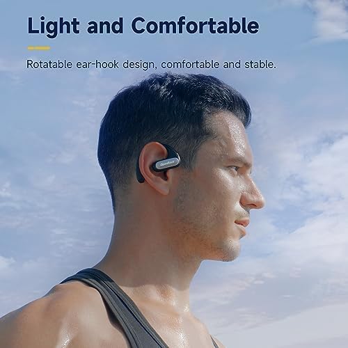 Man wearing OpenRock Pro headphones, demonstrating their light and comfortable fit.