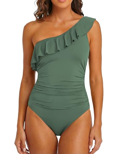 Model wearing bathing suits with tummy control for curvy figures.