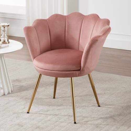 Design Unico a Forma di Fiore: La nostra poltrona in velluto si distingue per il suo design unico a forma di fiore. Lo schienale elegante e i braccioli distesi come una corolla creano un'atmosfera sofisticata e accogliente. Questo design non solo è esteticamente piacevole, ma offre anche un comfort superiore, rendendo ogni momento di relax un'esperienza speciale.
