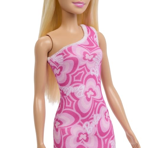 Image of Barbie Dolls in Barbiecore-Inspired Outfits with Pink & Purple Heels, Variety of Pink Patterned Dresses and Hair Colors