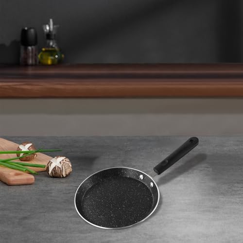 Disfruta cocinando con la sartén para crepes sin revestimiento de 18 cm, mango ergonómico y distribución uniforme del calor para obtener resultados deliciosos (negro)