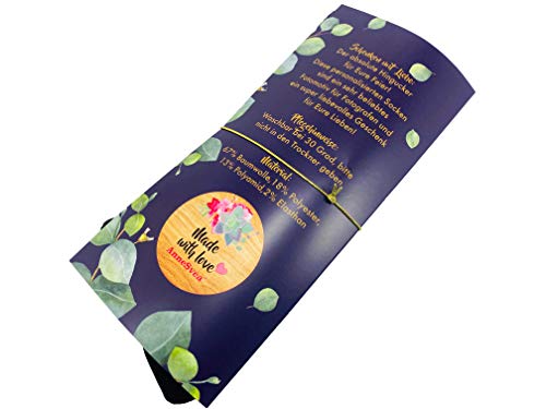 AnneSvea, calzini neri con scritta in lingua