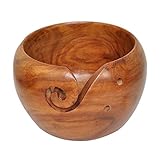 Este hermoso cuenco de hilo de madera ha sido hecho a mano por artesanos indios. Está hecho a mano con madera de sheesham con un hermoso acabado lacado de alto brillo.