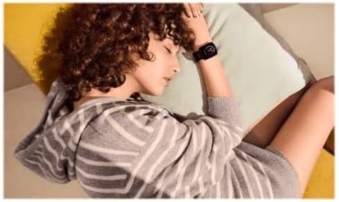 posterior view of the Xiaomi Redmi Watch 2 Lite showing the optical heart rate sensor and charging pins.