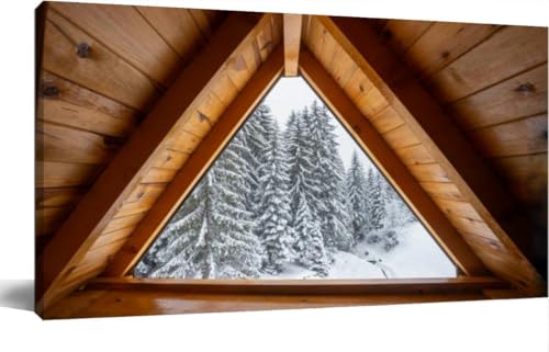 Cozy wooden attic window framing stunning snow covered pine forest