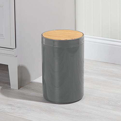 Image of mDesign Plastic Round Trash Can Small Wastebasket - Garbage Bin Container with Swing-Close Lid - Bathroom Garbage Basket - Holds Waste, Recycling - 1.3 Gallon - Basa Collection - Charcoal Gray /Natural