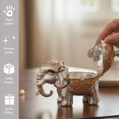 Image of Metal Elephant Shaped Decorative Storage Jar with Glass Bowl & Metal Spoon | Gold Finish and White Enamel Container for Dry Fruits, Mouth Freshener, Spices & Table Decor (Orange)