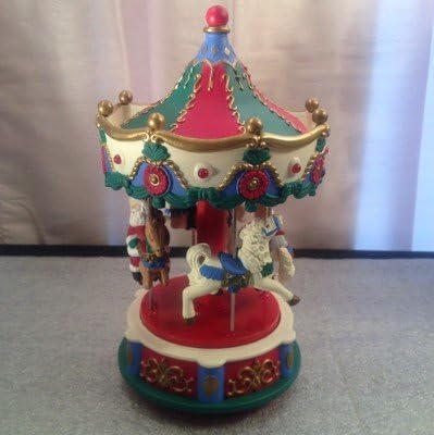 Vintage Avon Santa's Caroling Carousel 1995