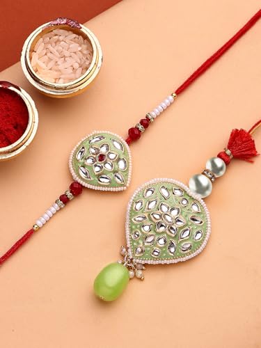 Image of Sukkhi Rakhi Creative Gold Plated with Meenakari Handwork Om Rakshabandhan Lumba Rakhi for Brother Bhaiya Bhabhi with Roli Chawal & Greeting Card|Set of 2