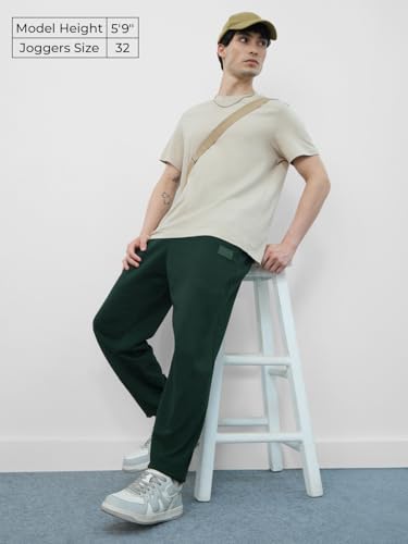 Image of The Souled Store Solids: Dark Green Mens and Boys Drawstringed Baggy Fit Cotton Blend Oversized Joggers